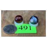 2 slag glass marbles