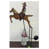 Balancing tin cowboy