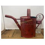 Red metal water can