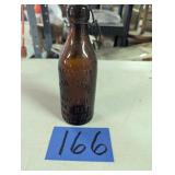 Embossed Quaker Root Beer Bottle