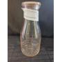 C.H Harnish Embossed Milk Bottle