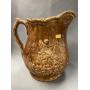 Rockingham Glazed Embossed Pitcher