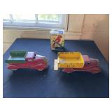 (2) Antique Toy Trucks and Mechanical Parrot