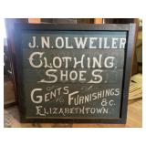 Early Painted Wood Clothing Sign
