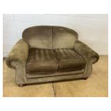 Ellane Upholstered Loveseat With Brass Tack Decora