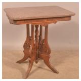 American Victorian Walnut Marble-Top Parlor Stand.