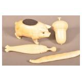 Four Antique Bone Figural Sewing Accessories.