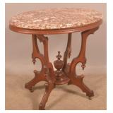 American Victorian Walnut Marble-Top Parlor Stand.