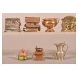 Seven Various Antique Metal Sewing Tape Measures.