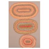 Three Oval Multi-Colored Braided Table Mats.