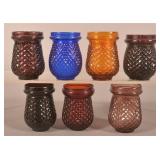 7 Various Colored Glass Christmas Candle Cups.