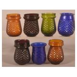 Seven Colored Glass Christmas Candle Cups.