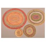 Four Round/Oval Multi-Colored Braided Table Mats.