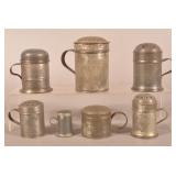 Graduated Set of 7 Antique Tin Shakers.