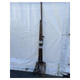 Selection of Garden Tools Includes Pitchforks and