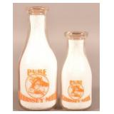 Two Foxden Farms Dairy Milk Bottles.