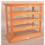 A.N. Russel Oak & Glass Ribbon Store Display.