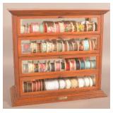 Country Store A.N. Russell Oak Ribbon Cabinet.