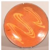 Pennsylvania Slip-Decorated Redware Pie Plate.