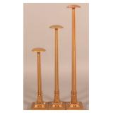 Three Art Deco Gold-Painted Store Display Stands.