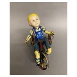 Early Tin Wind-Up Boy on Tricycle