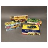 4 Vehicle-Themed Tin Toys and Model