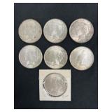 (7) Peace Silver Dollars