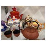 Porcelain and Cast Metal Teapots