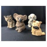 Animal Form Still Banks with Wind-Up Dog