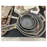 (4) Unsigned Cast Iron Frying Pans