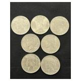 (7) Peace Silver Dollars