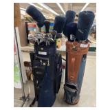 (2) Golf Bags with Assorted Clubs