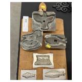 Cookie Cutters Mounted on Cutting Board