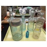 Embossed Bottles and Jar