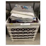 Towels and Bed Linens with Plastic Crate