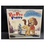 Vintage Pee Pee Puppy Toy