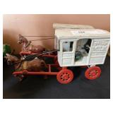 (2) Cast Metal Milk Wagons