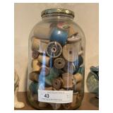 Vintage Glass Jar with Wooden Spools
