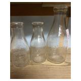 (3) F.M. Stauffer Milk Bottles