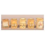 Decorated "Left Handed" Russell Henry Pitchers