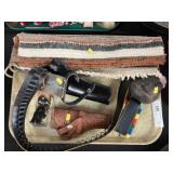 Leather Holsters, Woven Rug