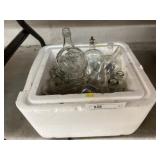 Grouping of Embosses and Clear Glass Bottles