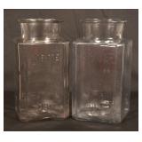 Pair Embossed "Kis-Me" Glass Counter Display Jars