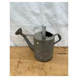 Galvanized sprinkling can