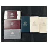 (6) Commemorative Silver Dollars