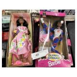 (4) Barbie Dolls