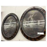 2 Oval Framed Cupid Portraits