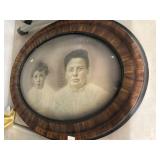 2 Oval Framed Portraits