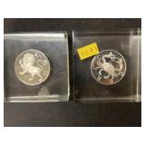 2 Zodiak Tokens Encased in Plastic