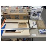 Cellophane, Telephone, & Drafting Board